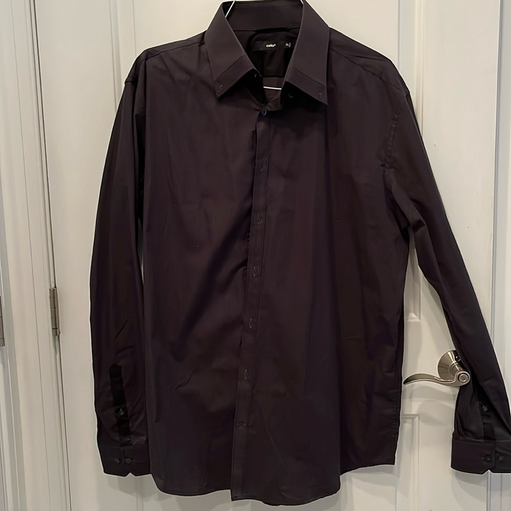 Men’s button down shirt, XXL but more like XL in size.  Worn twice